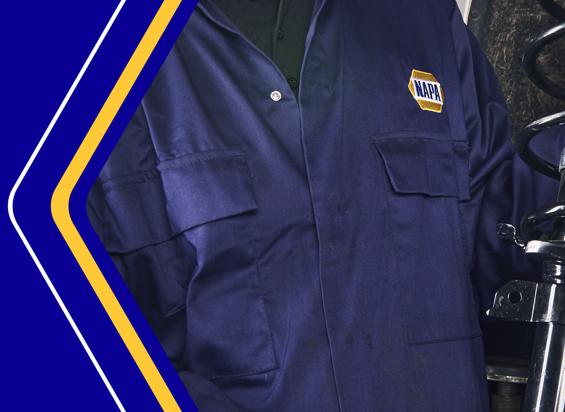 Mechanic in NAPA overalls